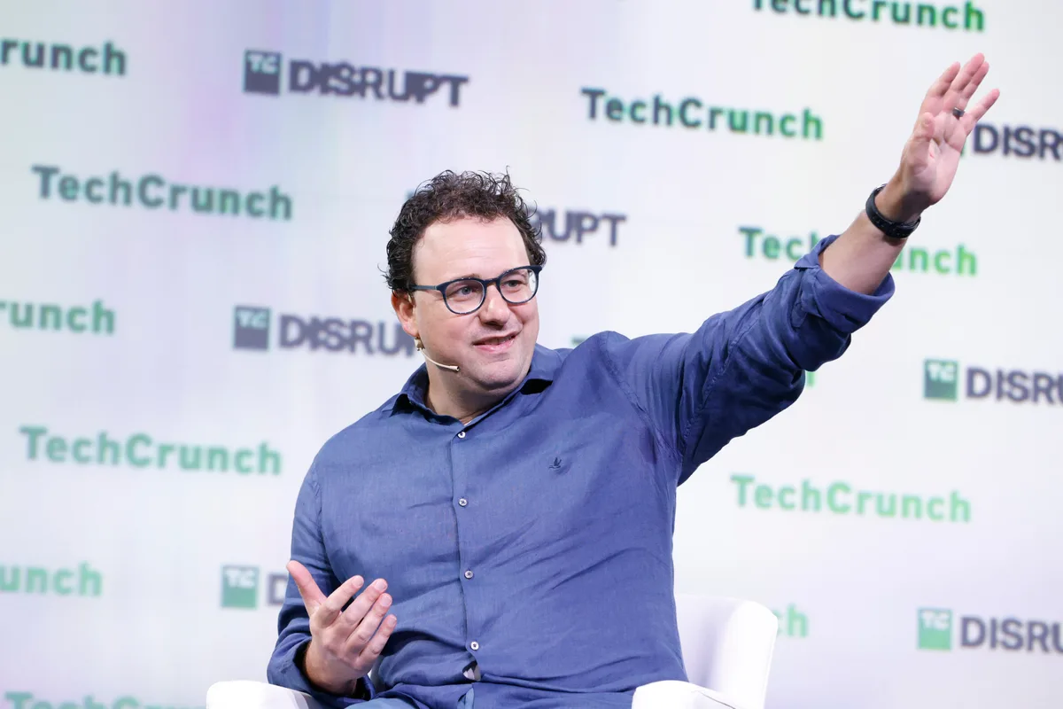 Anthropic CEO Dario Amodei speaking onstage at TechCrunch Disrupt 2023