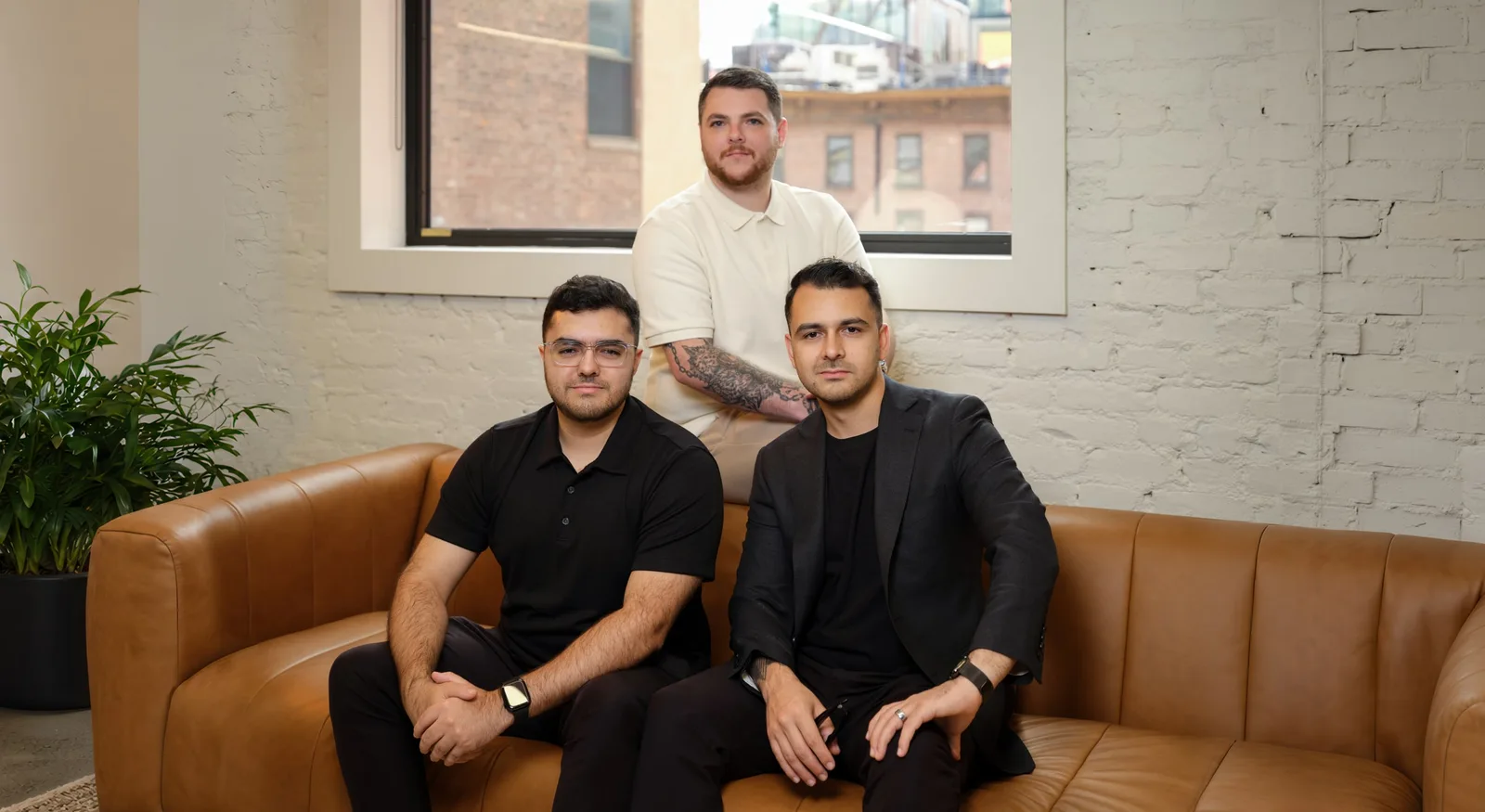 Official Comp AI Series A team portrait of three co-founders