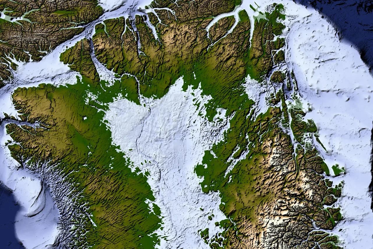 NASA Earth Observatory map showing inferred buried valleys beneath Greenland ice.